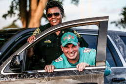 Miami Dolphins DT Durval Queiroz Neto Interacts with BSO Officer at Football Unites Ride Along